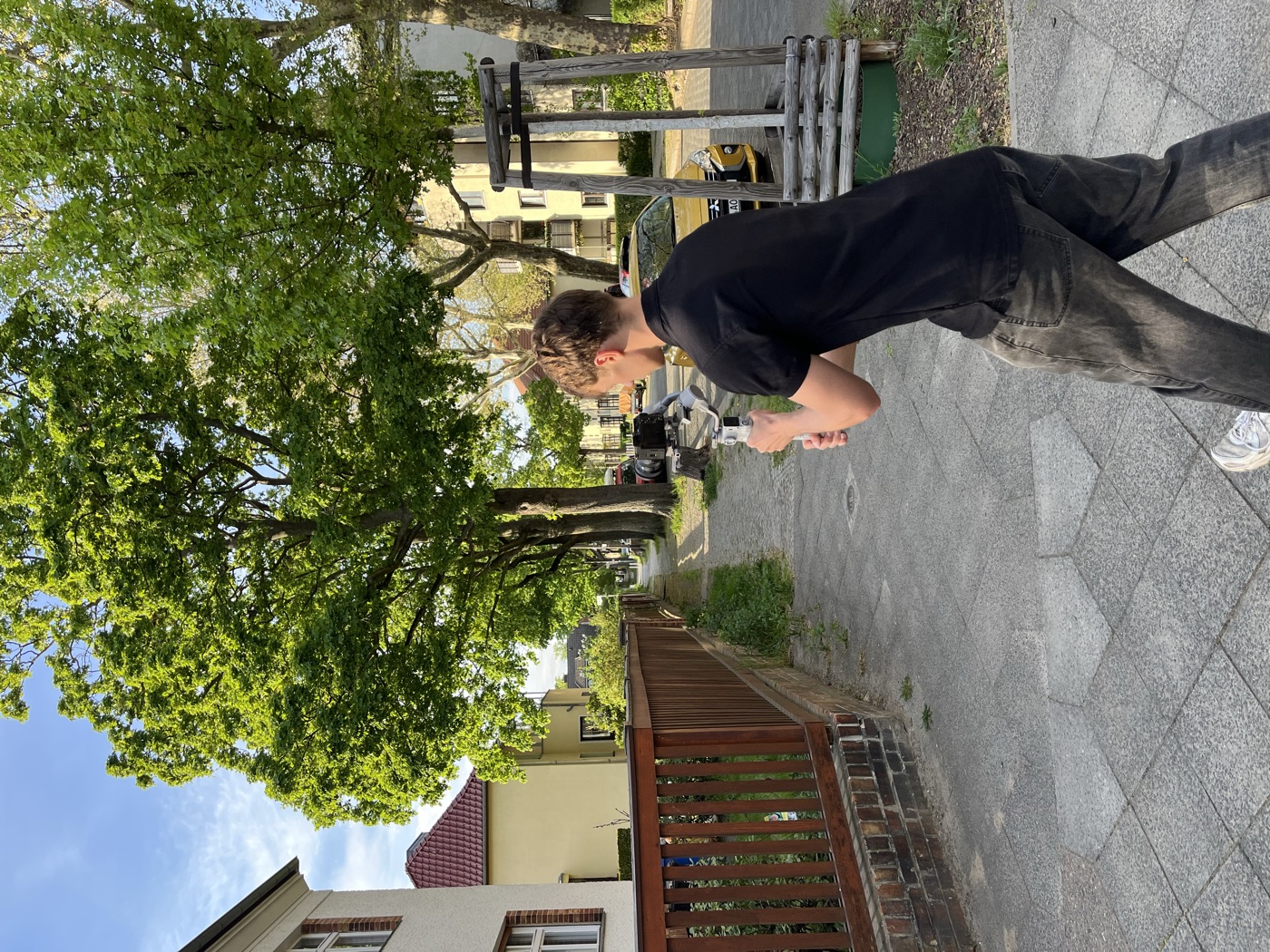 Felix filming on location with a gimbal-mounted camera